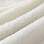 Babyponcho mit Teufelsmotiv