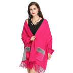 Damenponcho mit Felltaschen