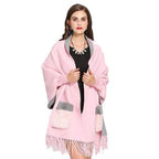 Damenponcho mit Felltaschen