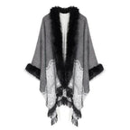Feiner Damenponcho mit Pelzkragen
