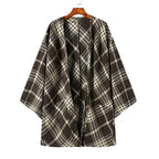Fein karierter Herrenponcho