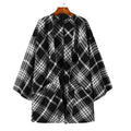 Fein karierter Herrenponcho