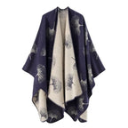 Baumwollponcho mit bunten Motiven