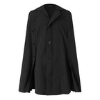 Langer Herrenponcho mit Knöpfen