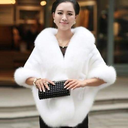 Luxuriöser Damen-Poncho aus Kunstfell