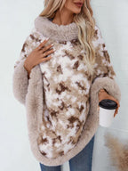 Marmorierter Pullover-Poncho mit Fell