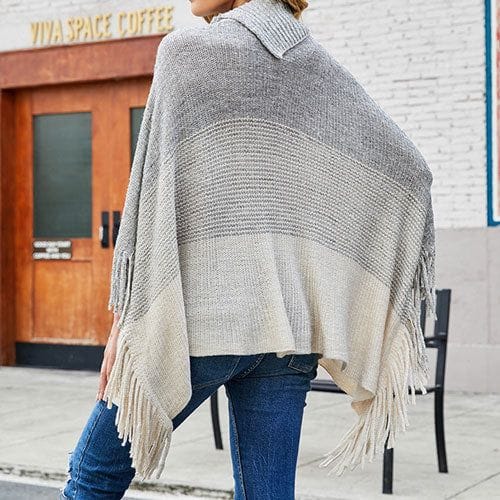 Warmer Poncho mit Knöpfen