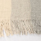 Warmer Poncho mit Knöpfen