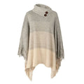Warmer Poncho mit Knöpfen